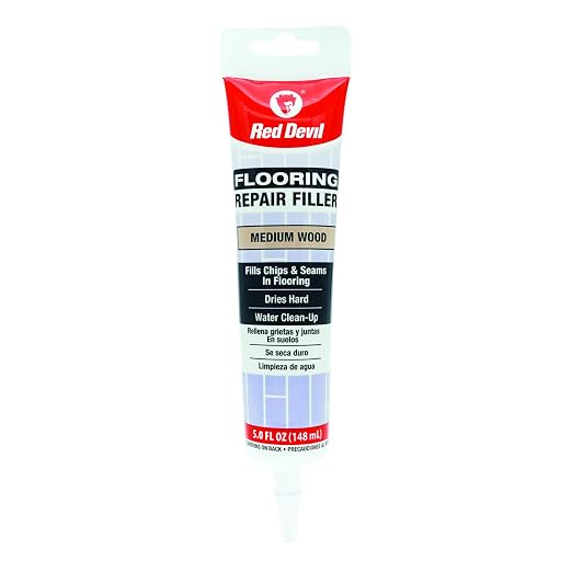 Red Devil 056025 Flooring Repair Filler, 5 oz., Medium Wood, 1 Pack by RedDevil