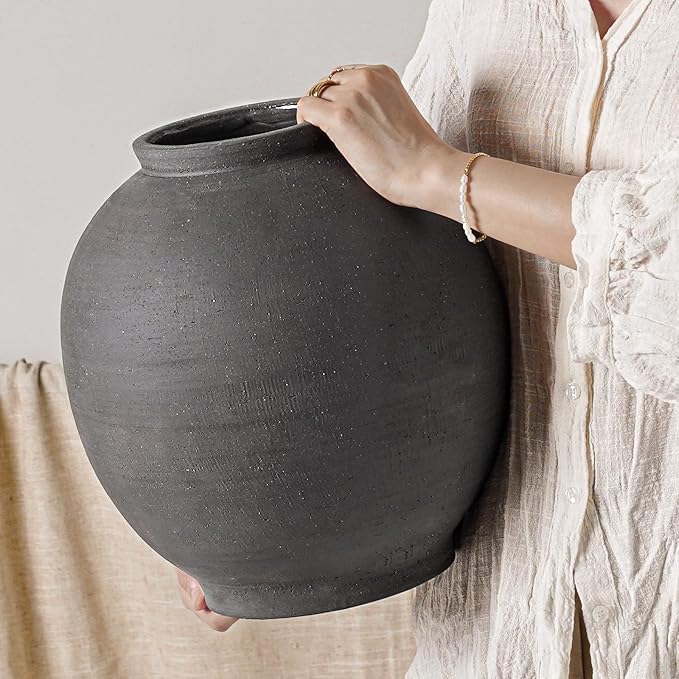 Black Ceramic Vase by LETAUCIGARDEN